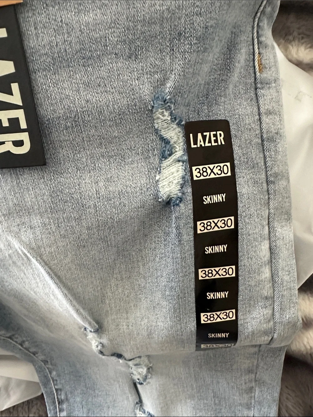 LAZER Men’s Light Blue Skinny Jeans with Distressed Details